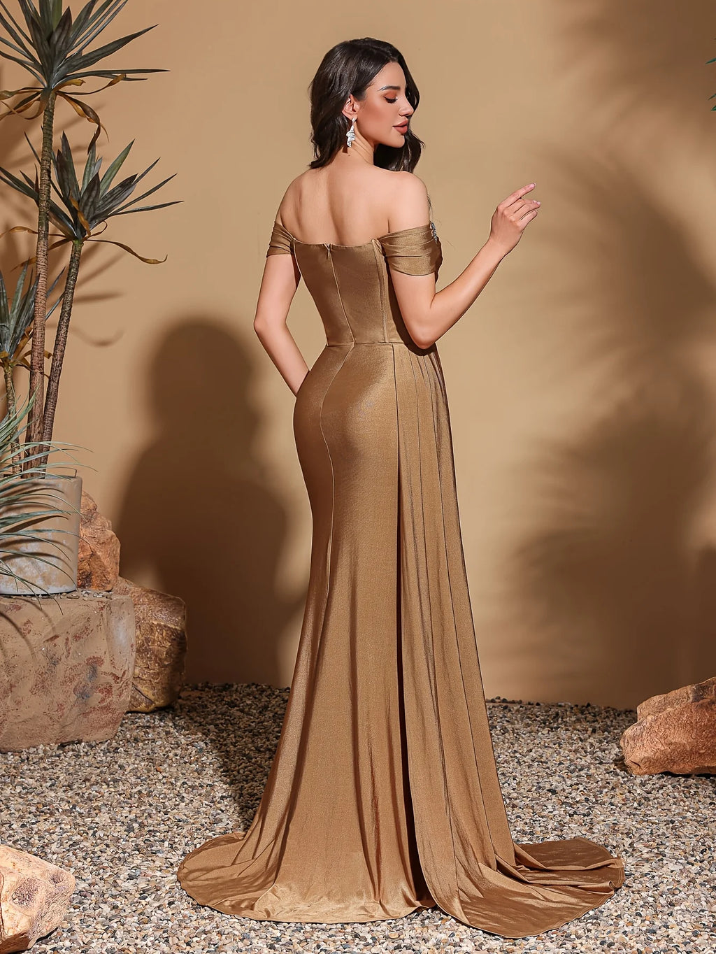 One-shoulder dress with rhinestone embellishments, side flaps and slits