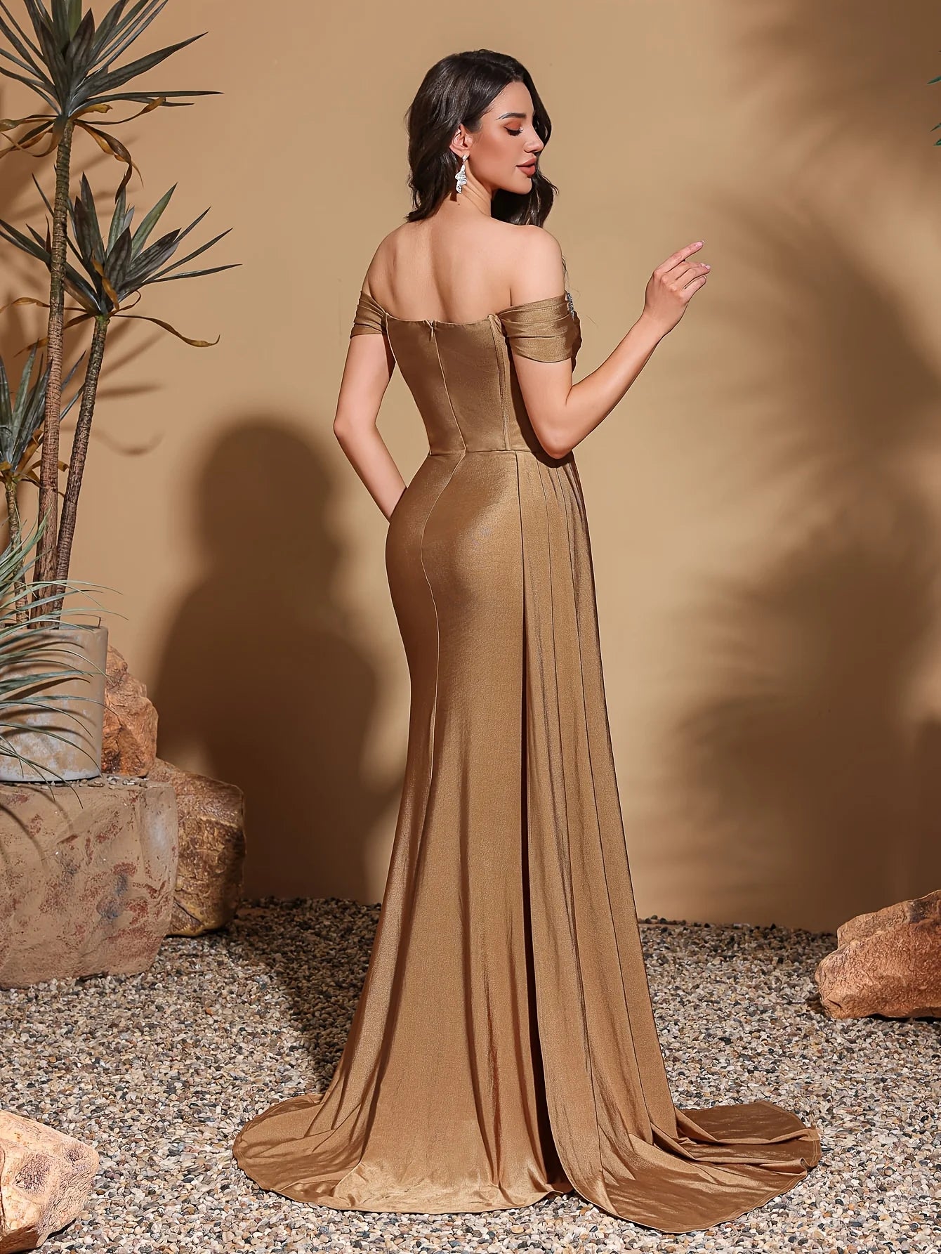 One-shoulder dress with rhinestone embellishments, side flaps and slits